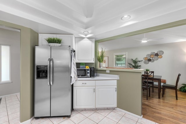 68-1740 Akaula St, Waikoloa, HI 96738 - kitchen featuring stainless steel appliances, white cabinetry, a ceiling fan, a peninsula, and light tile patterned flooring
