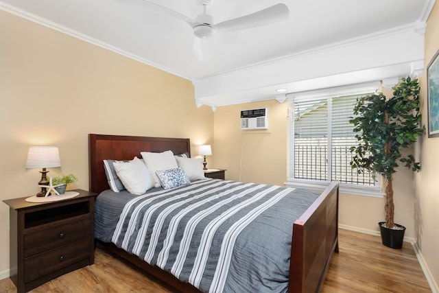 68-1740 Akaula St, Waikoloa, HI 96738 - bedroom with wood finished floors, ornamental molding, a wall mounted air conditioner, and a ceiling fan