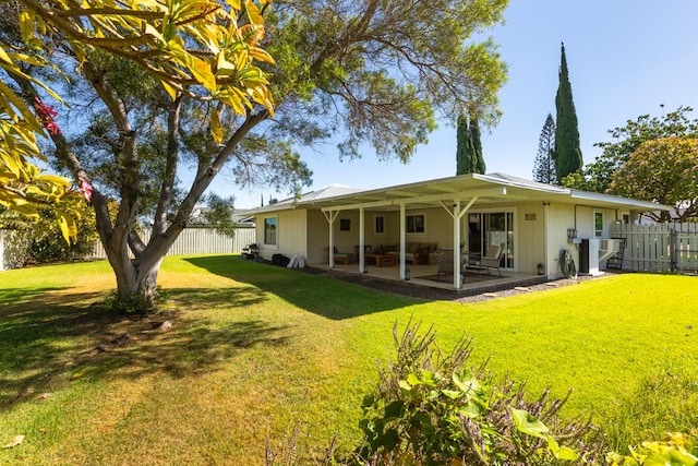 68-1740 Akaula St, Waikoloa, HI 96738 - back of property featuring a fenced backyard and a patio