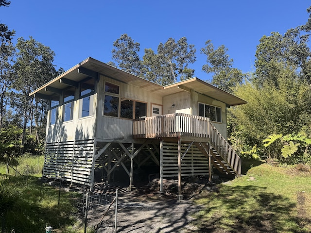 11-3135 Alii Kane St, Volcano, HI 96785 - view of front of house with stairs and a wooden deck