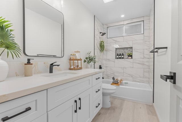 16-2110 Tangerine Dr, Pahoa, HI 96778 - full bathroom with vanity, wood finished floors, tub / shower combination, and recessed lighting