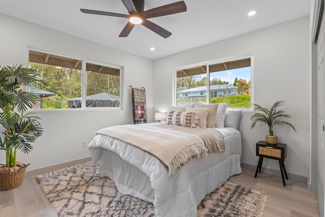 16-2110 Tangerine Dr, Pahoa, HI 96778 - bedroom with light wood-style flooring, recessed lighting, and a ceiling fan