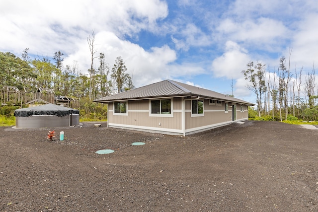 16-2110 Tangerine Dr, Pahoa, HI 96778 - view of side of property featuring a metal roof