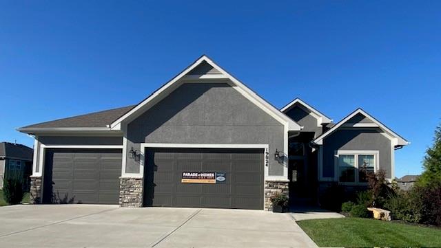 craftsman inspired home with a garage