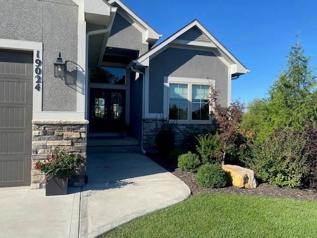 entrance to property with a garage