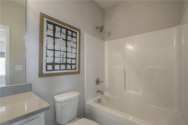 full bathroom featuring shower / washtub combination, toilet, and vanity