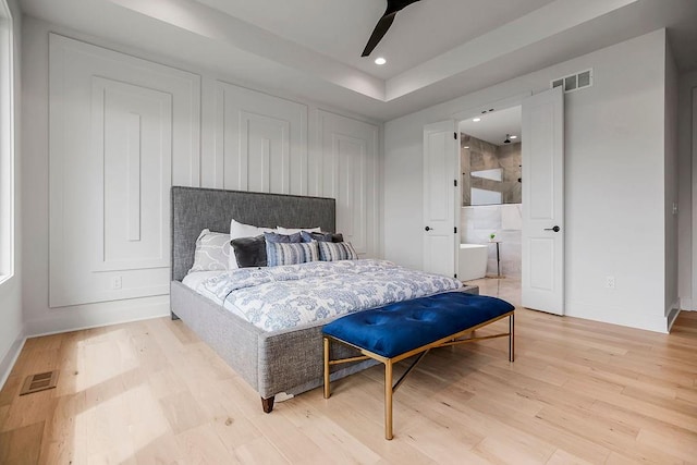 bedroom featuring ceiling fan and hardwood / wood-style flooring