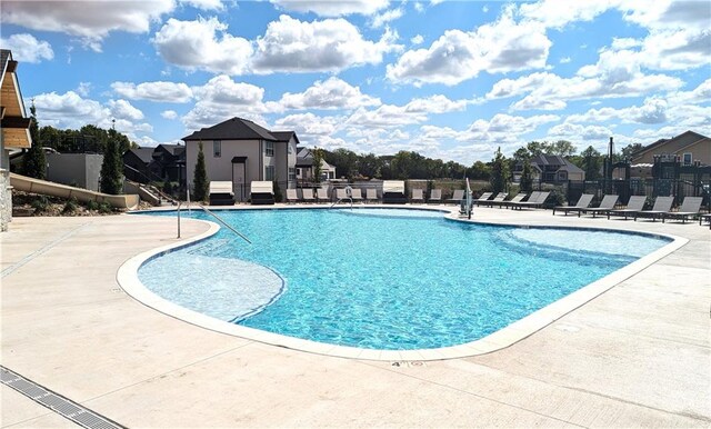 view of swimming pool featuring a patio