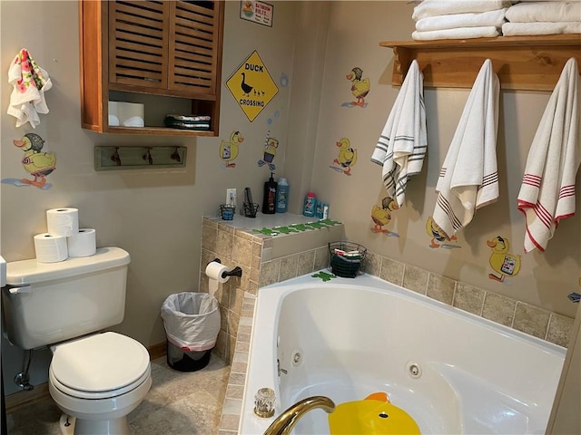 bathroom with tiled bath and toilet