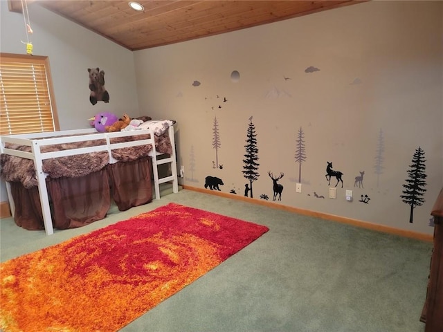 bedroom featuring carpet floors and wood ceiling