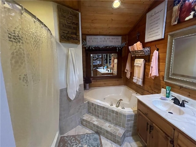 bathroom featuring tiled bath, wooden ceiling, and vanity