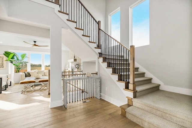 2301 W 180th St, Overland Park, KS 66085 - stairway featuring plenty of natural light and wood-type flooring