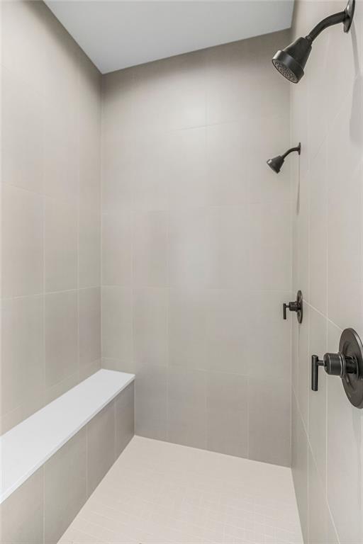 2301 W 180th St, Overland Park, KS 66085 - full bathroom featuring tiled shower