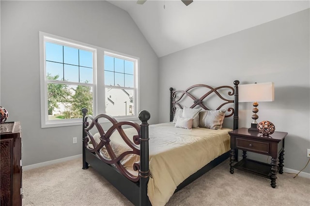 bedroom with lofted ceiling, light colored carpet, and ceiling fan