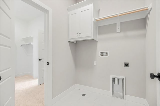 25025 W 92nd St, Lenexa, KS 66227 - clothes washing area featuring electric dryer hookup, washer hookup, cabinet space, and baseboards
