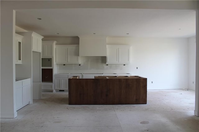 kitchen featuring white cabinetry and a center island