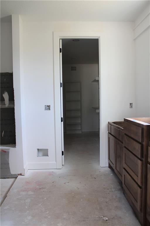 bathroom with concrete floors