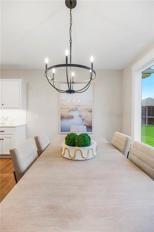 16388 S Brougham Dr, Olathe, KS 66062 - dining space featuring an inviting chandelier and light wood-style floors