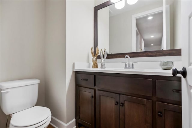 16388 S Brougham Dr, Olathe, KS 66062 - half bath with vanity, baseboards, and toilet