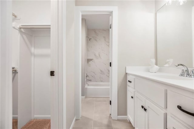 16388 S Brougham Dr, Olathe, KS 66062 - full bathroom featuring vanity,  shower combination, baseboards, and tile patterned flooring
