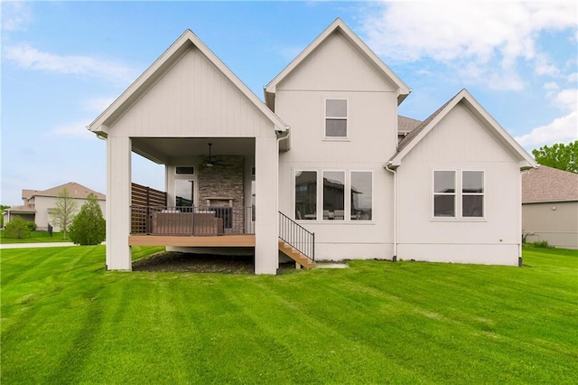 16388 S Brougham Dr, Olathe, KS 66062 - back of house with a lawn, ceiling fan, and a wooden deck