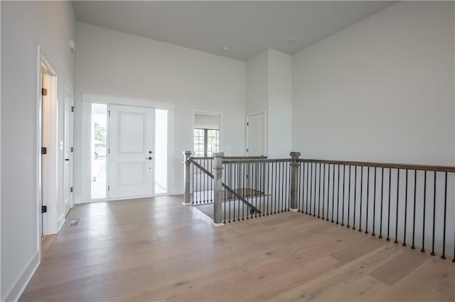 entryway with light hardwood / wood-style flooring