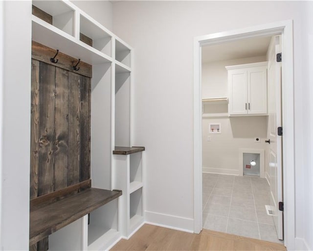 mudroom with light wood-type flooring