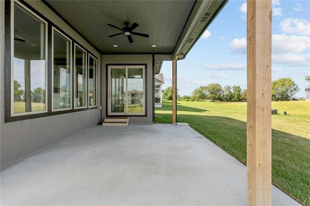 view of patio with ceiling fan