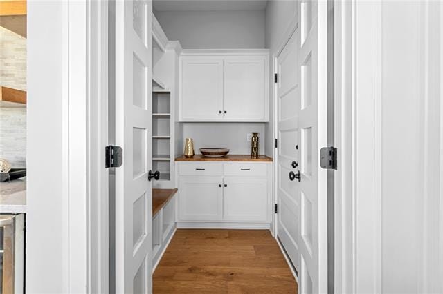 pantry with wine cooler