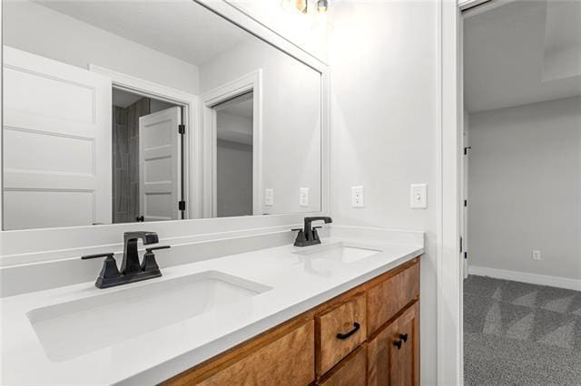 bathroom featuring double vanity