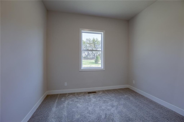 view of carpeted spare room