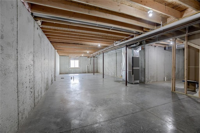 basement featuring heating unit