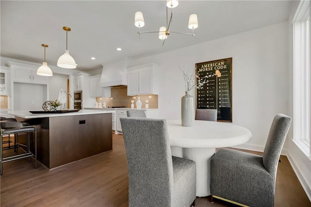 25212 W 92nd St, Lenexa, KS 66227 - dining area with recessed lighting, an inviting chandelier, and dark wood-type flooring