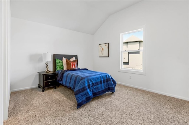 25212 W 92nd St, Lenexa, KS 66227 - bedroom featuring vaulted ceiling, light carpet, and baseboards