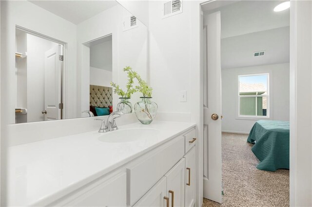 25212 W 92nd St, Lenexa, KS 66227 - ensuite bathroom with baseboards, visible vents, connected bathroom, and vanity