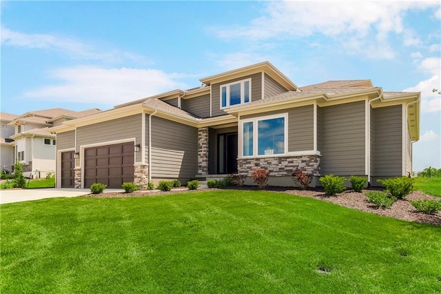 view of front facade with a front lawn and a garage