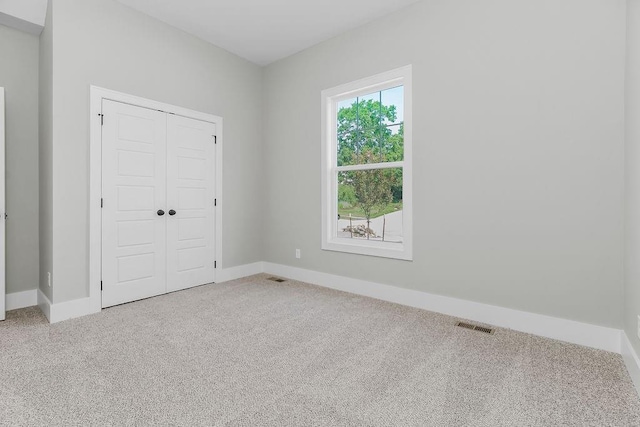 23217 W 124th Pl, Olathe, KS 66061 - unfurnished bedroom featuring carpet and a closet