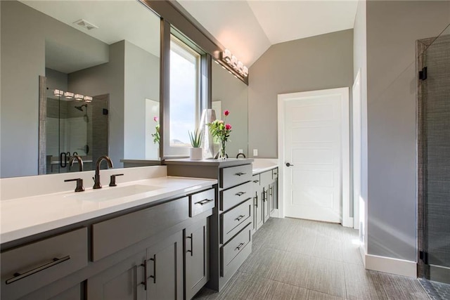 23217 W 124th Pl, Olathe, KS 66061 - bathroom with vanity, a shower stall, and vaulted ceiling
