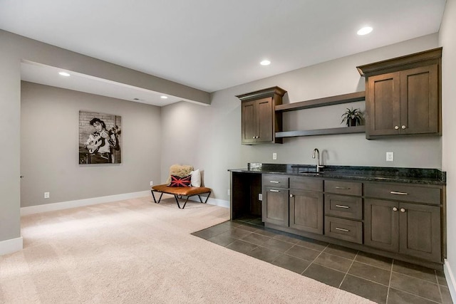 bar featuring dark colored carpet, baseboards, and recessed lighting