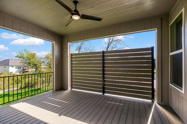 wooden terrace with ceiling fan