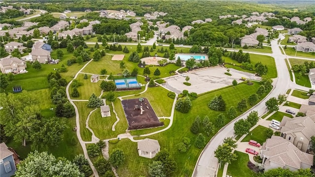 birds eye view of property with a residential view