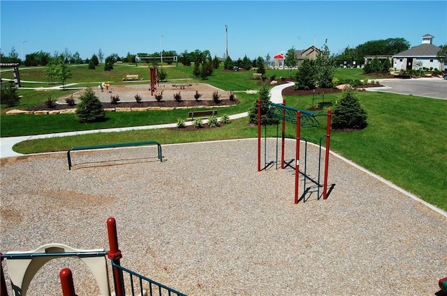 view of home's community with a lawn
