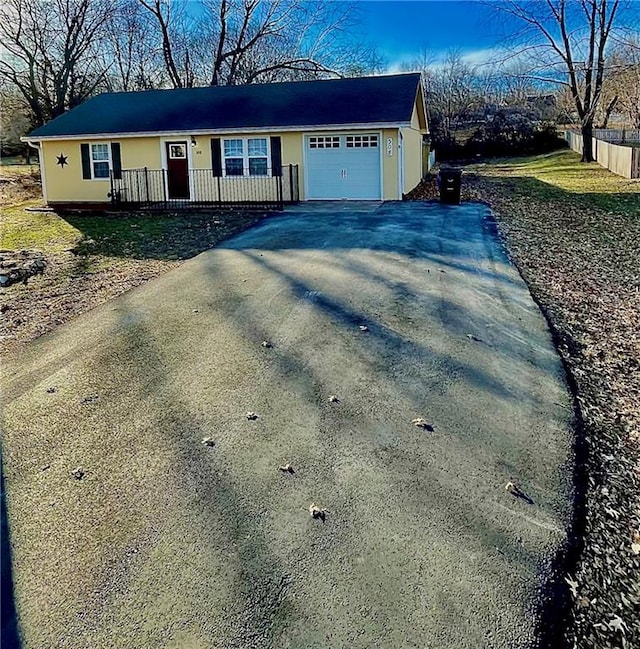 view of front of home featuring a garage