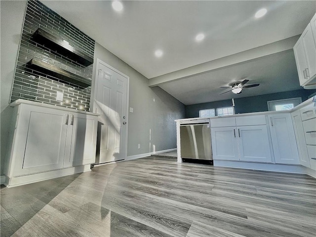 kitchen featuring light hardwood / wood-style flooring, stainless steel dishwasher, ceiling fan, and white cabinets