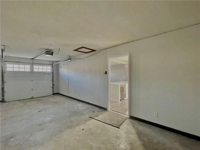 garage featuring a garage door opener