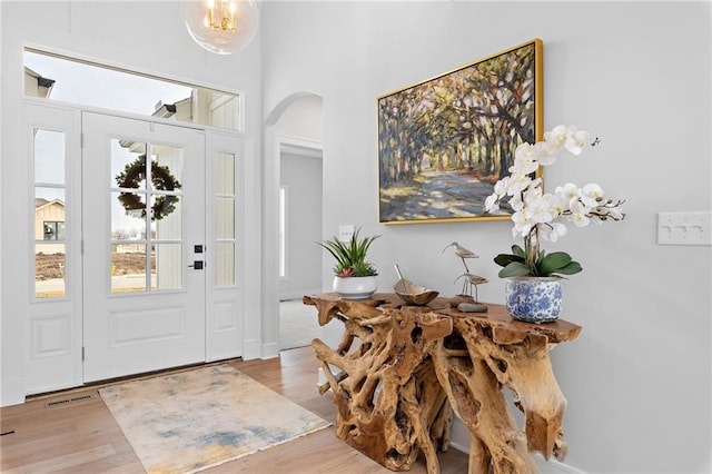 entrance foyer featuring hardwood / wood-style floors