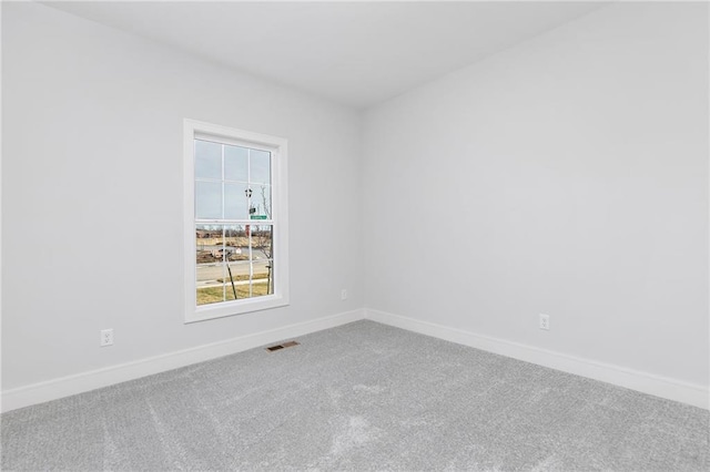 spare room with carpet flooring