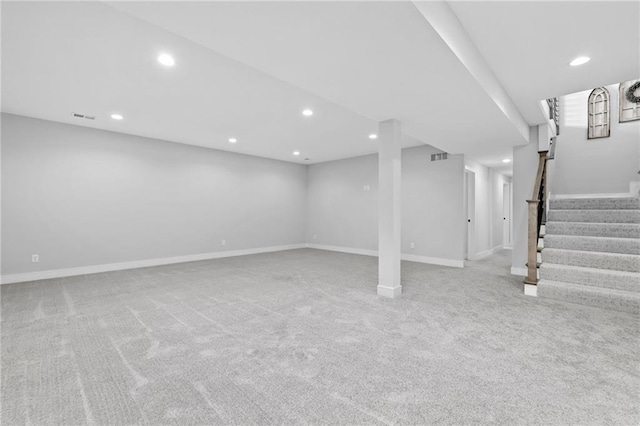 basement with light colored carpet