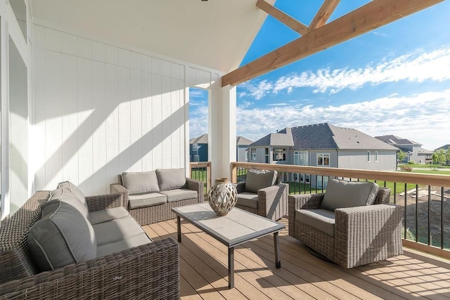 wooden deck featuring an outdoor hangout area