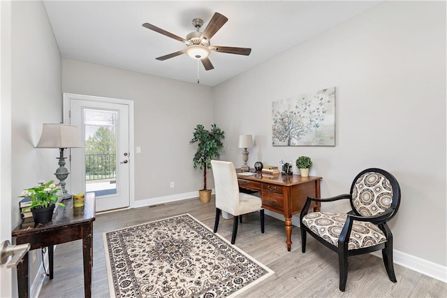 home office featuring ceiling fan and light wood-type flooring